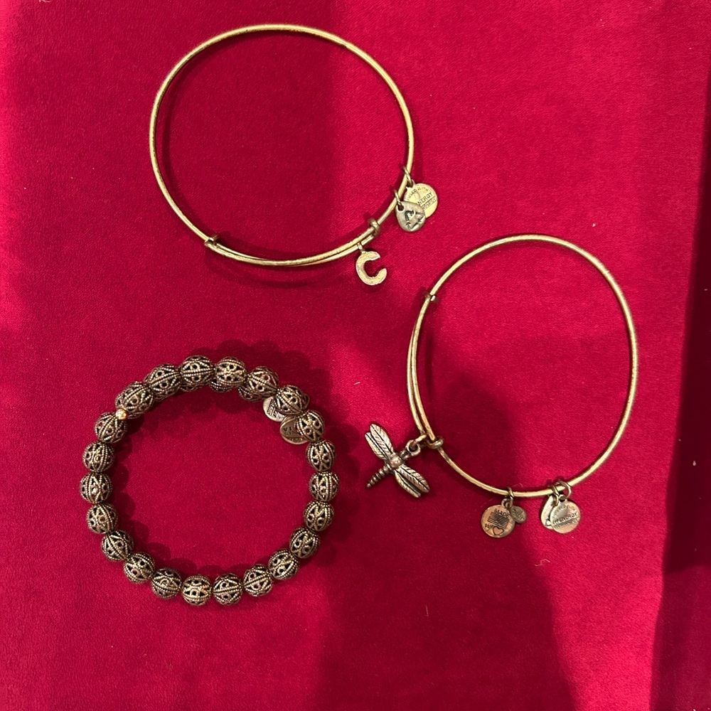 Alex and Ani set of 6 - 3 Gold and 3 Silver Bracelets Set. Needs cleaning